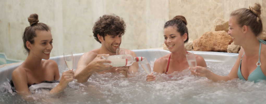 friends chatting in hot tub