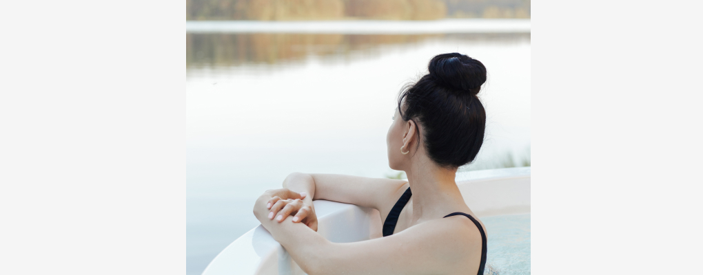 woman in hot tub looking out